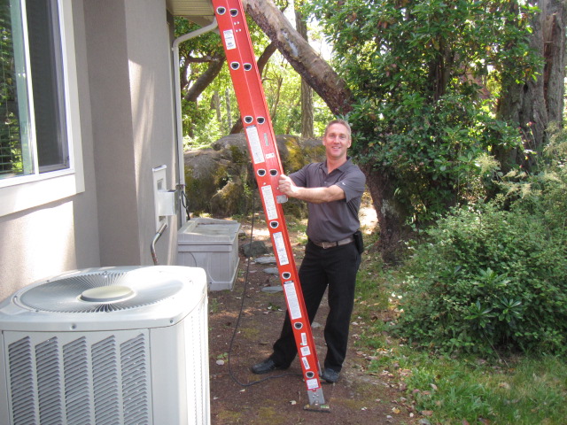 Garth standing by his ladder